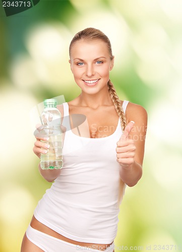 Image of beautiful woman with bottle of water