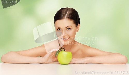 Image of woman with green apple