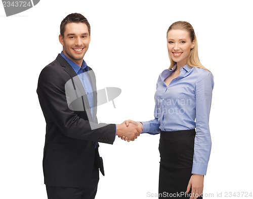 Image of man and woman shaking their hands
