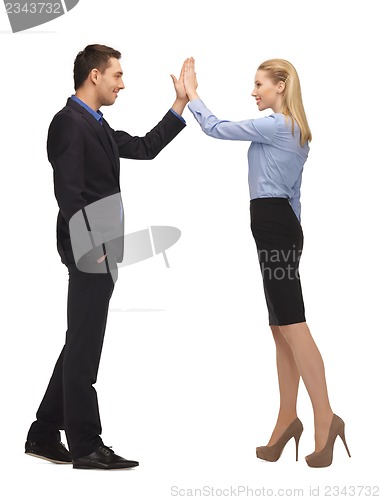 Image of man and woman giving a high five