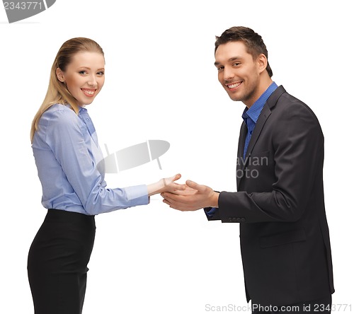 Image of man and woman showing something on the palms