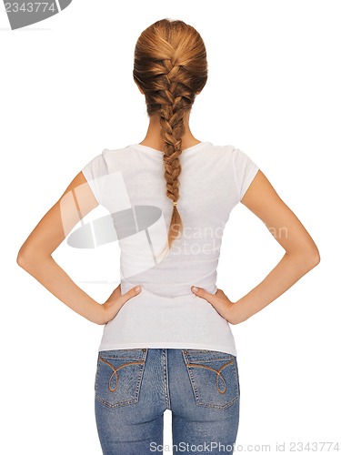 Image of rear view of woman in blank white t-shirt