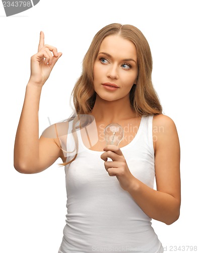 Image of woman with energy saving bulb