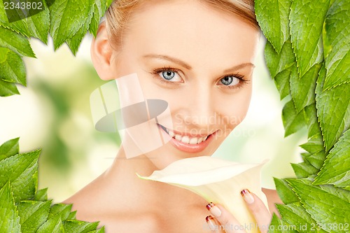 Image of beautiful woman with calla flower