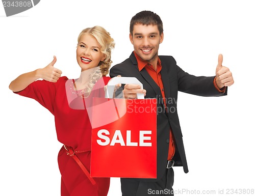 Image of man and woman with shopping bag
