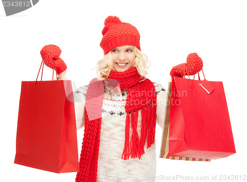 Image of young girl with shopping bags