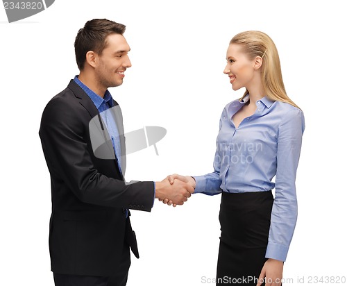 Image of man and woman shaking their hands