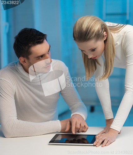 Image of man and woman in laboratory