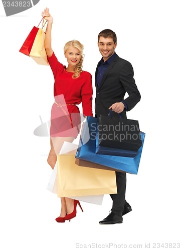 Image of man and woman with shopping bags