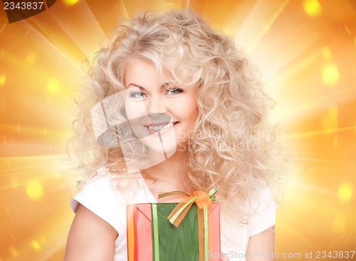 Image of happy girl with gift box