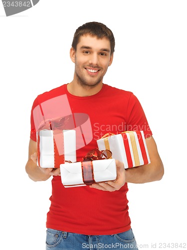 Image of man holding many gift boxes