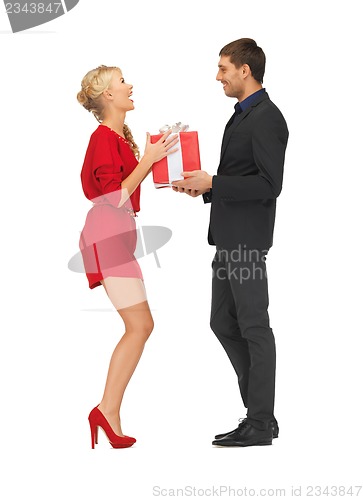 Image of man and woman with present