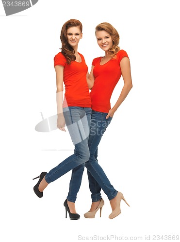 Image of two beautiful teenage girls in red t-shirts