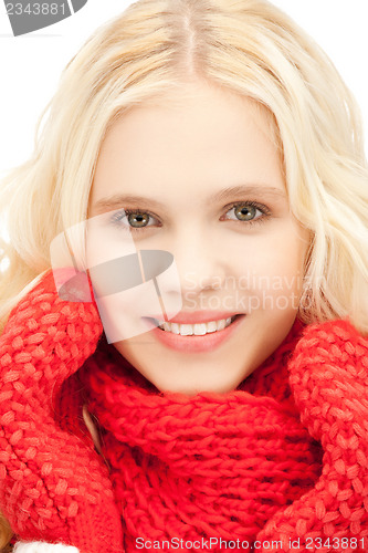 Image of beautiful woman in mittens