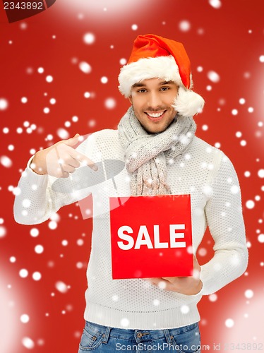 Image of handsome man in christmas hat