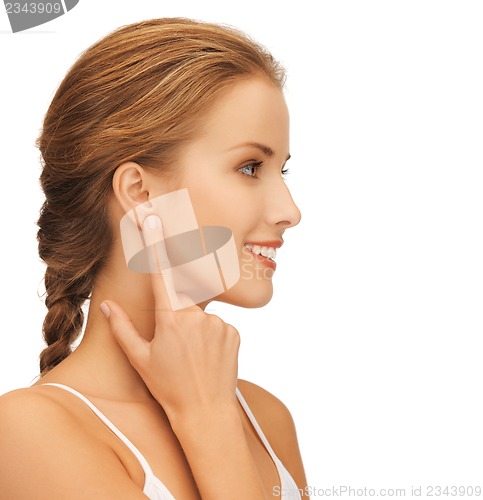 Image of woman pointing to ear