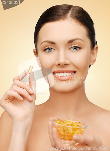 Image of woman with vitamins