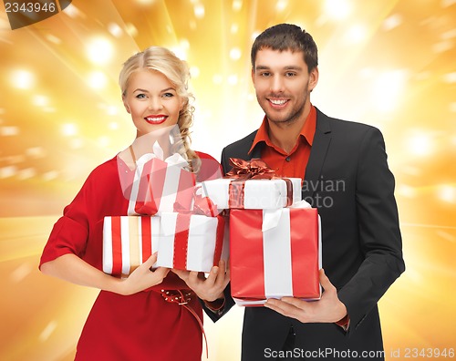 Image of man and woman with gift boxes