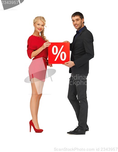 Image of man and woman with percent sign