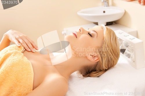 Image of beautiful woman in spa salon