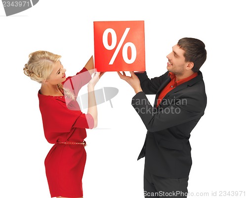 Image of man and woman with percent sign