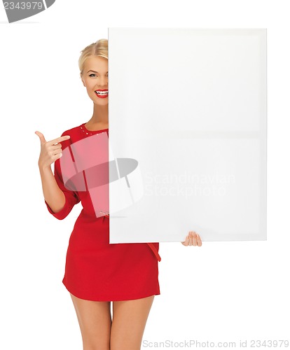 Image of lovely woman in red dress with blank board