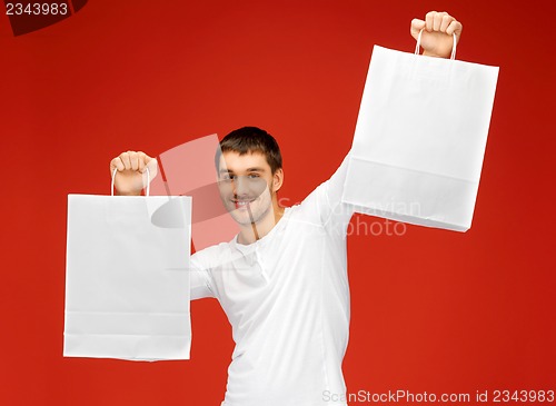 Image of man with shopping bags