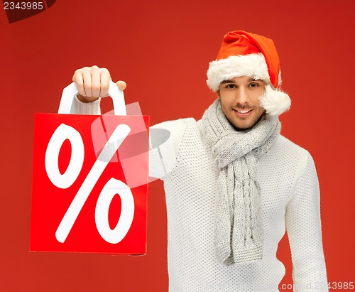 Image of handsome man in christmas hat