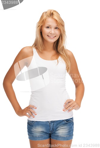 Image of smiling teenage girl in blank white t-shirt