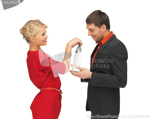 Image of man and woman with present