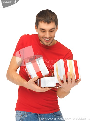 Image of man holding many gift boxes