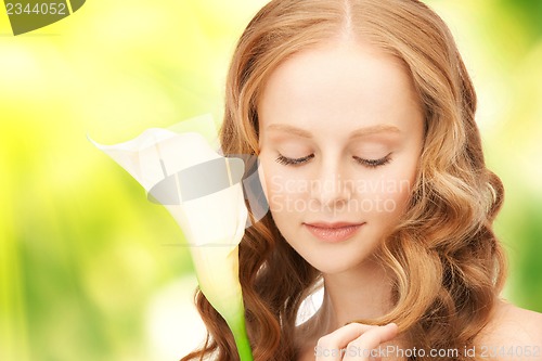 Image of beautiful woman with calla flower