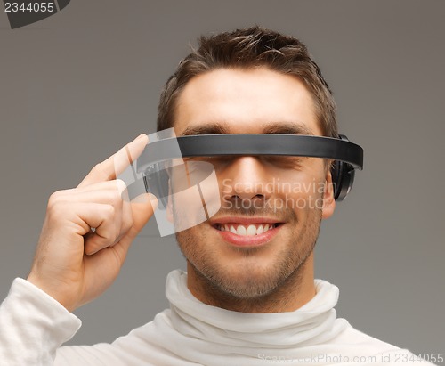 Image of man with futuristic glasses