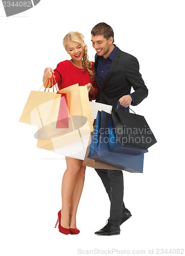 Image of man and woman with shopping bags