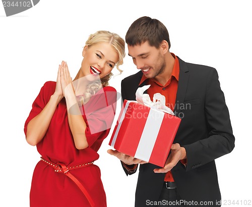 Image of man and woman with present