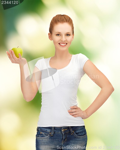 Image of teenage girl with green apple