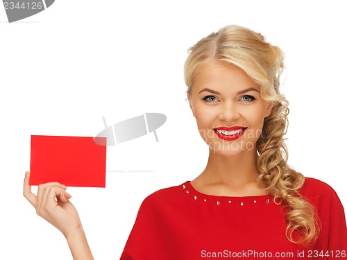 Image of lovely woman in red dress with note card