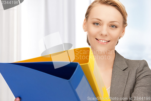 Image of woman with folders