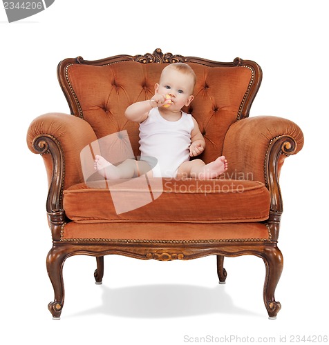 Image of baby boy with lollipop
