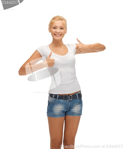 Image of teenage girl in blank white t-shirt with thumbs up