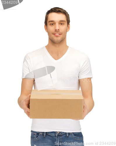 Image of handsome man with big box