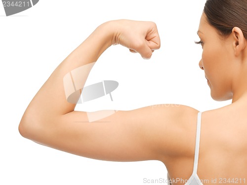 Image of sporty woman flexing her biceps