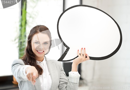 Image of smiling businesswoman with blank text bubble