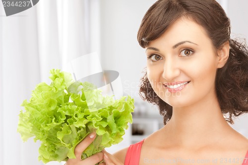 Image of woman with lettuce