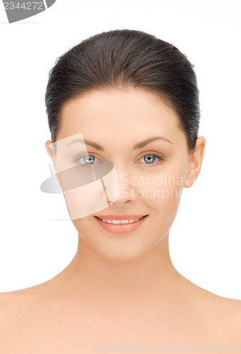 Image of face of beautiful young brunette woman