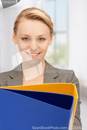 Image of woman with folders