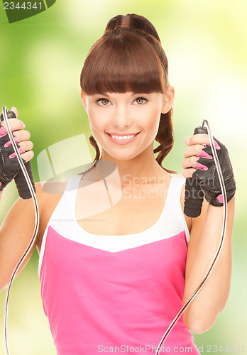 Image of fitness instructor with jump rope