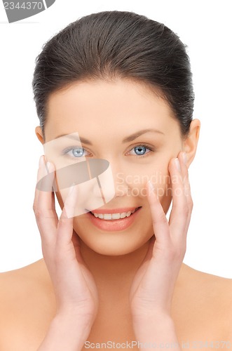 Image of face and hands of beautiful woman