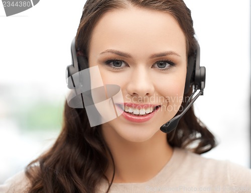 Image of friendly female helpline operator