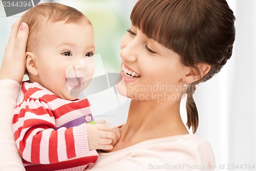 Image of happy mother with adorable baby